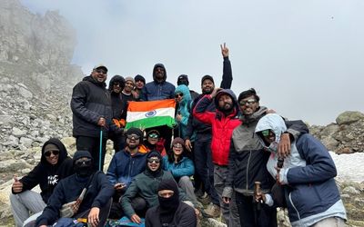 Our group posing at the top of Hampta Pass at 14,000 feet